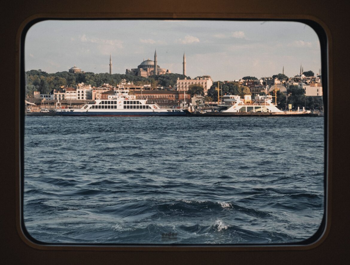 Sea and landscape through boat window